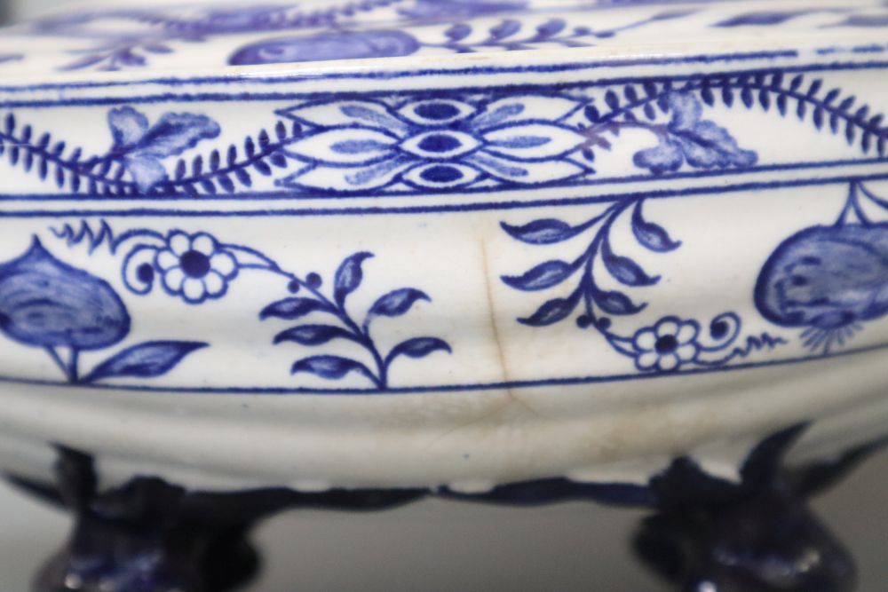 A Victorian Staffordshire blue and white sauce tureen and cover, three other pieces and a Coalport dish, painted with floral bouquets
